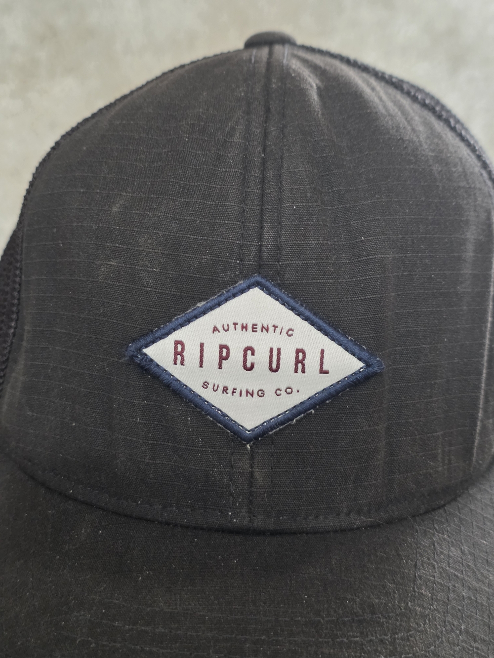Rip Curl Black Patch Trucker Hat